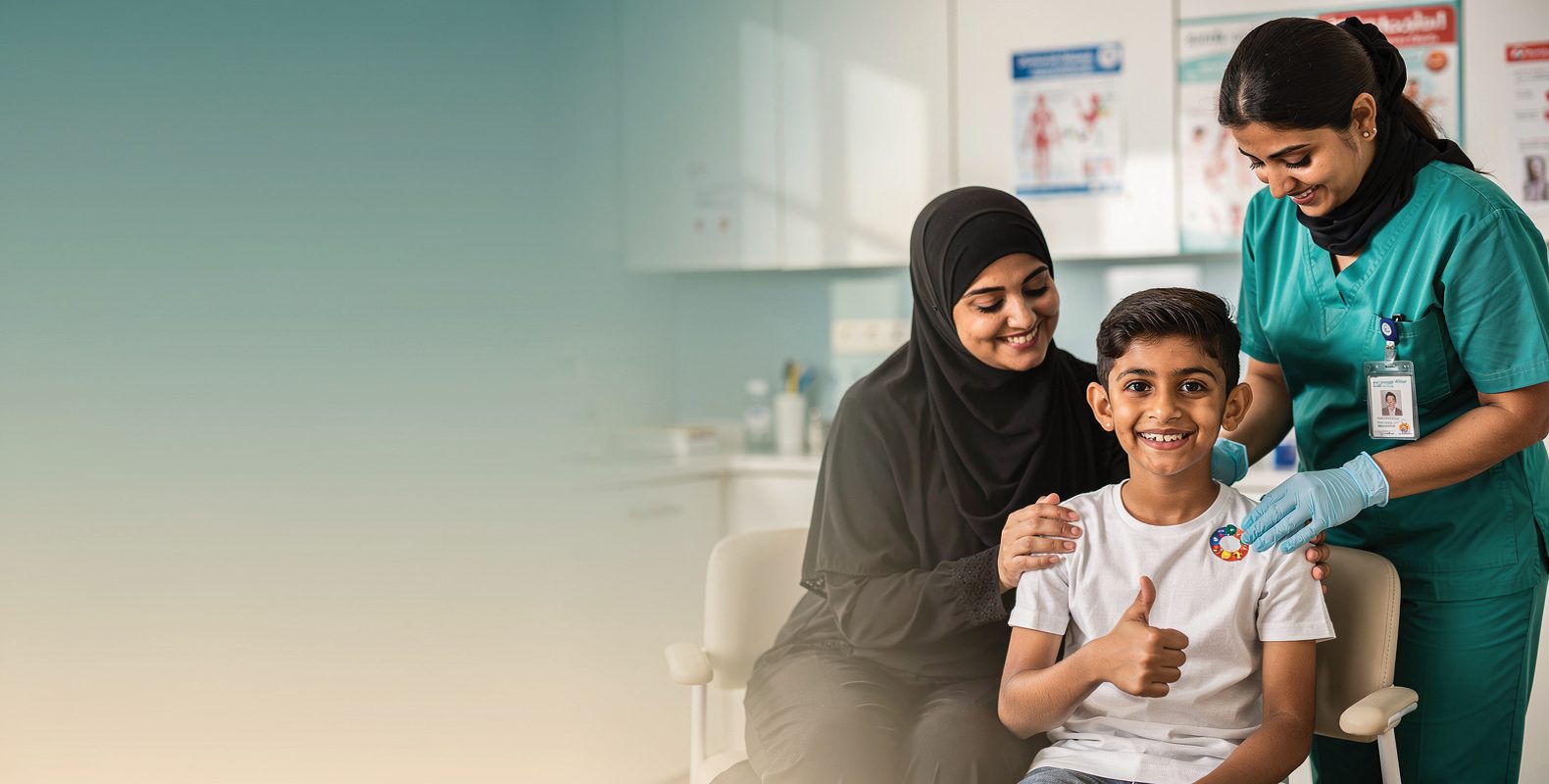 A smiling boy giving a thumbs-up after his vaccination, his mother and a nurse beside him